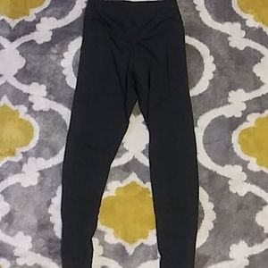 A pair of pink size small yoga pants.